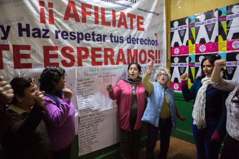 Paulina Luza at the union's headquarters directing members of the organization.