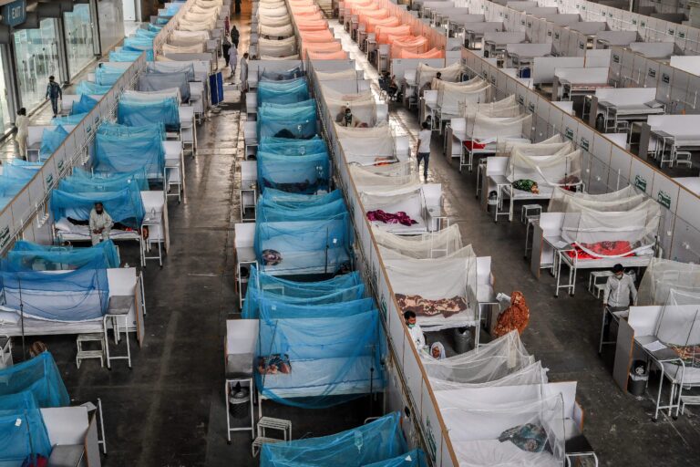 an aerial view of patients taking rest on beds.