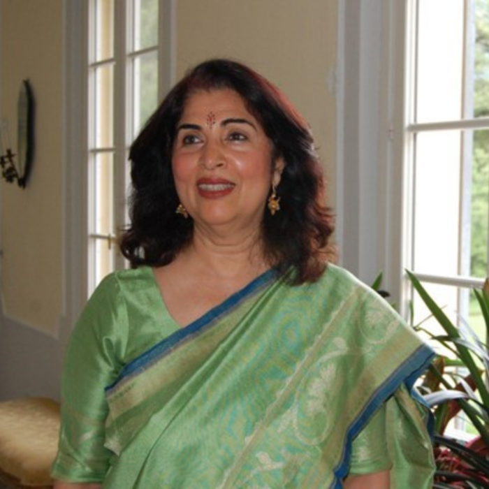 woman standing and smiling