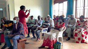 Nurse Doreen Nabwiire trains “vaccination champions” ages 50 and older in preparation for them to lead community dialogues with older Ugandans who have not yet been vaccinated against Covid-19. From these dialogues, IDI grew to understand barriers the community faces. (Video Courtesy Andrew Sweet)