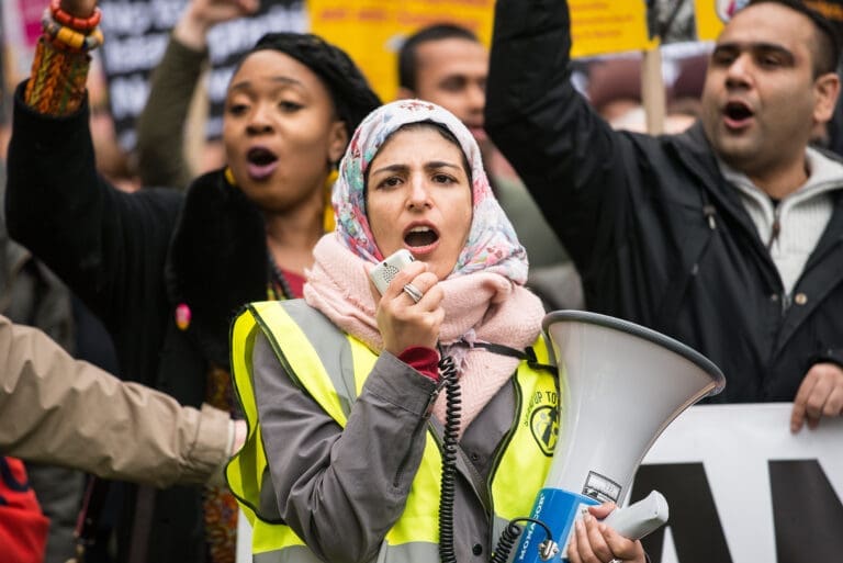 woman speaking in a bull horn