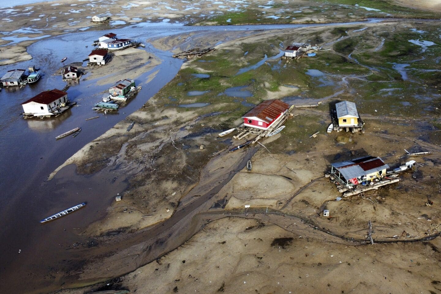 houseboats sitting on a land of drought