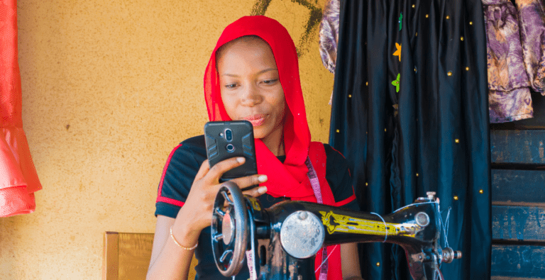 woman holding a phone in her hand