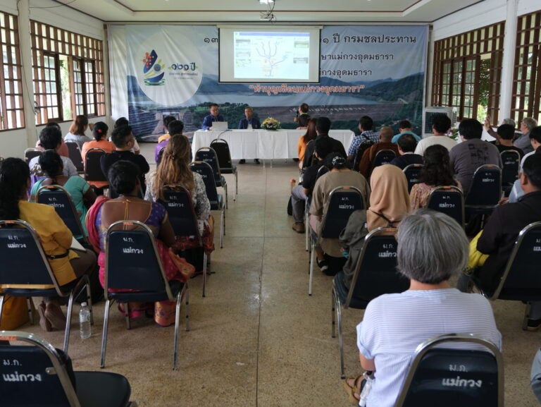 East-West Center Convening hearing a presentation during a dam visit in Thailand (Photo Credit Eric Arndt, The Rockefeller Foundation)