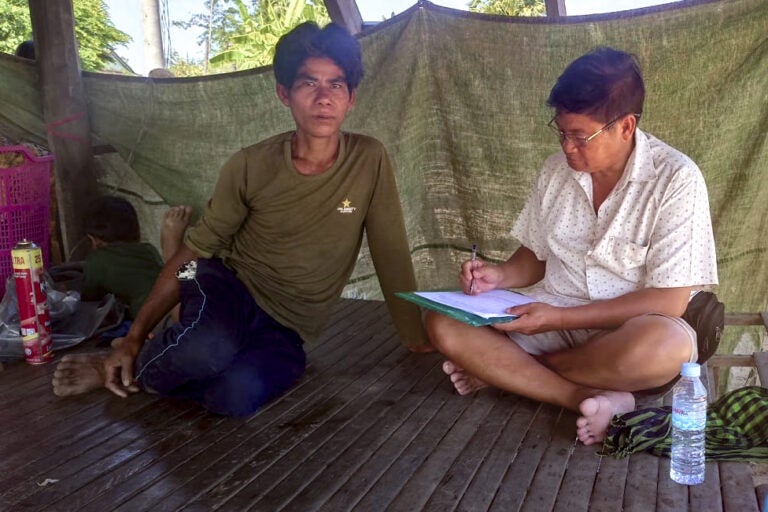Long Sochet conducting a study about fisherfolk livelihoods on Tonle Sap Lake in Kampong Thom Province (Photo Courtesy of Long Sochet)