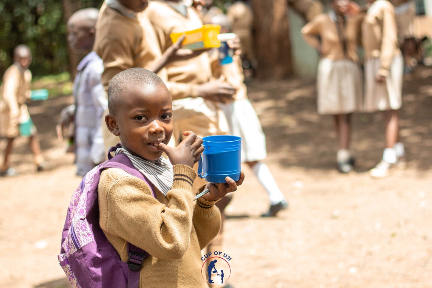 A young student drinks uji. (Photo courtesy of Cup of Uji)