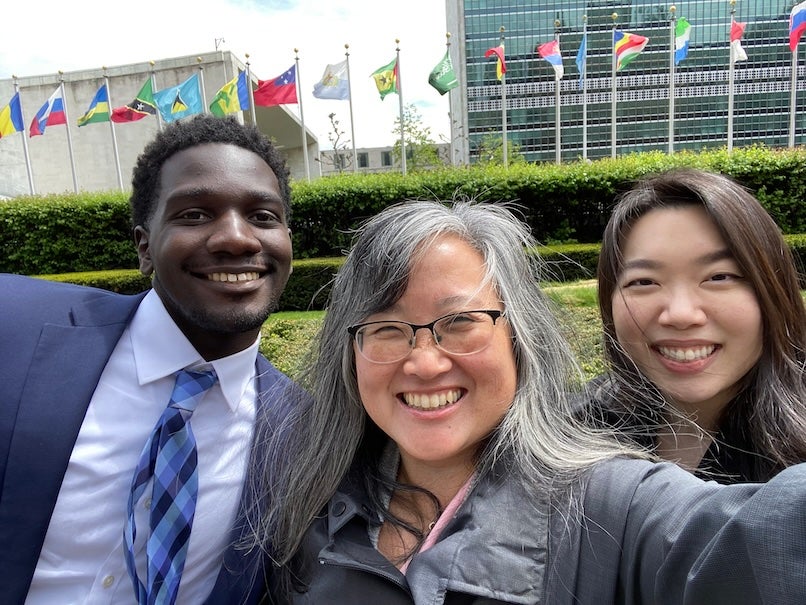 Doris Sullivan with co-workers Lucia Zhou and G. Terrell Seabrooks at the United Nations for the AI for the Planet Conference in May 2023