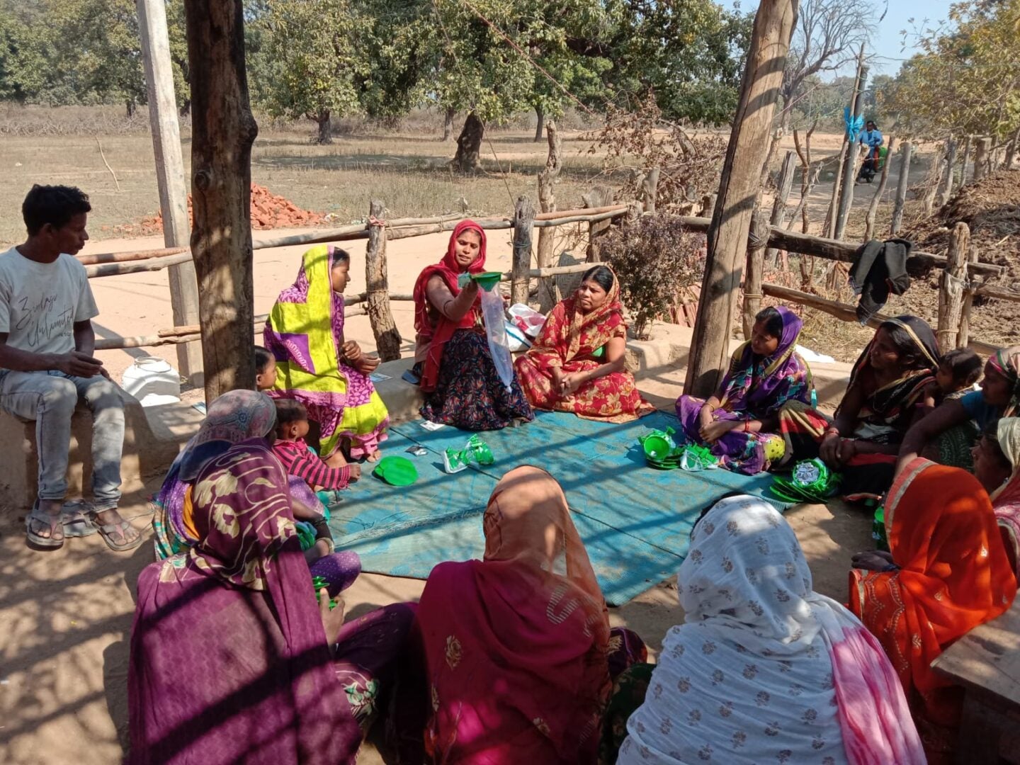 Women farmers gather in the heat of the day for a training session in Bihar, India